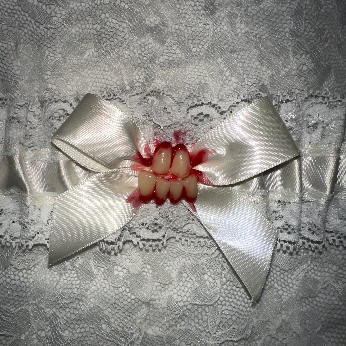 bloody teeth garter