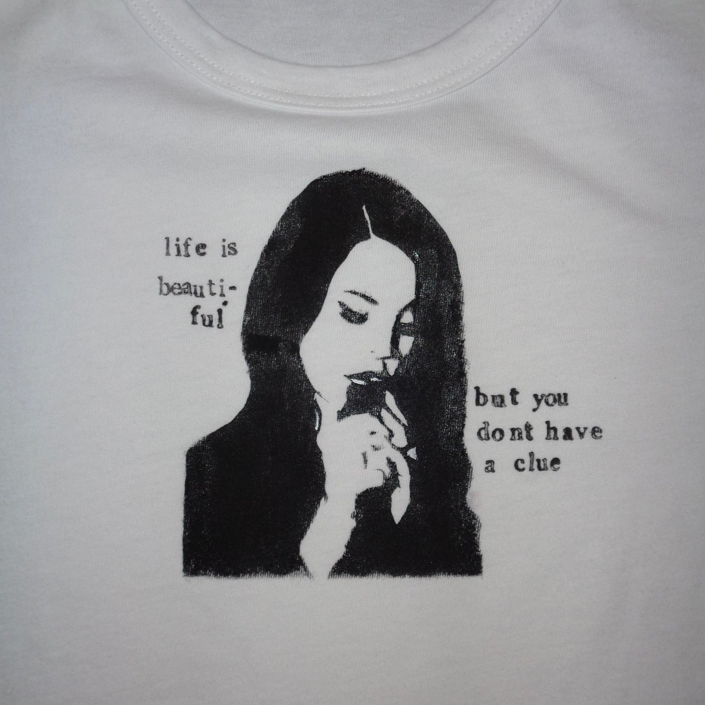 Lana “life is beautiful, but you don’t have a clue” baby tee
